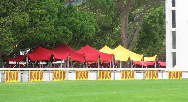 Red and yellow stretch tents at the 2010 J&B Met