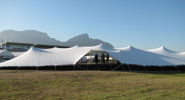 White stretch tents linked at the 2011 J&B Met