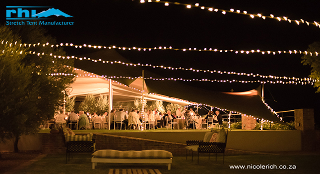 An RHI stretch tent being used for evening events